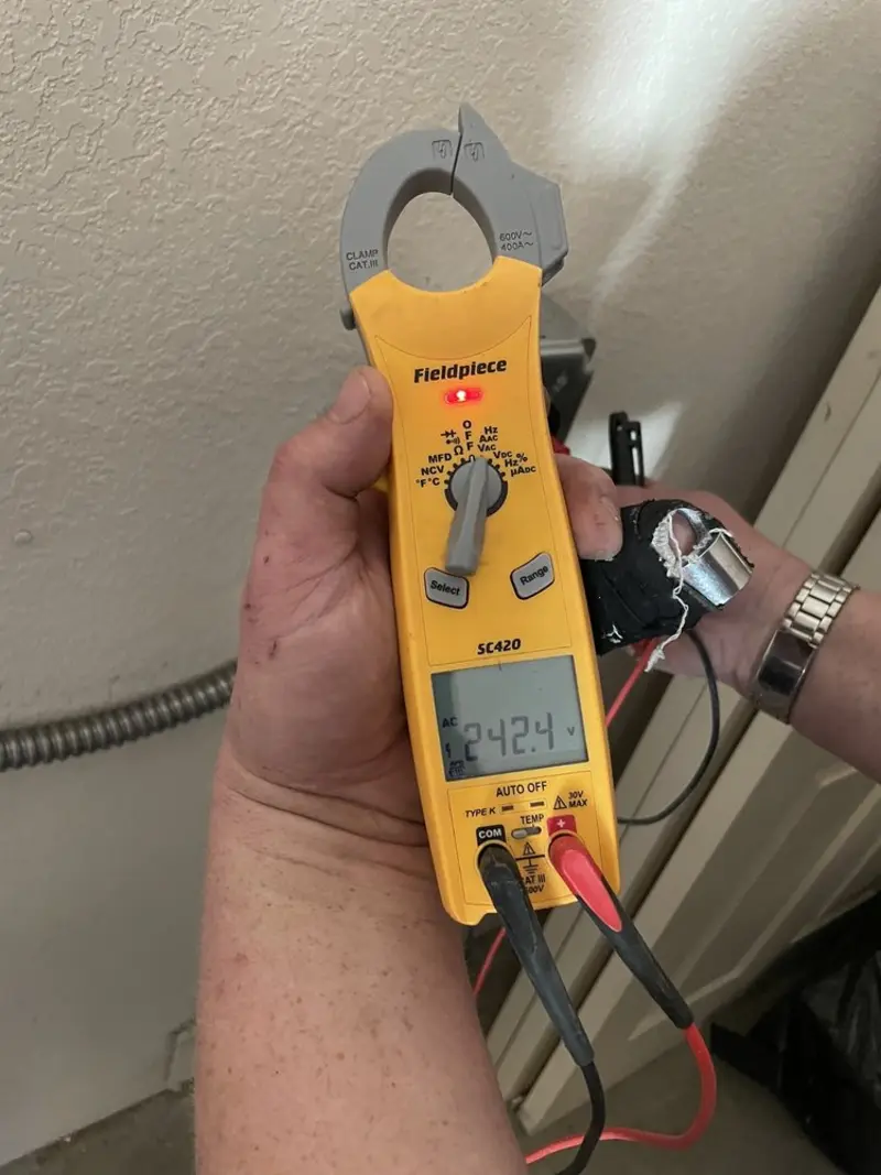 Voltage testing with clamp meter during Hot Tub / Pool Electrical Wiring in Shawnee